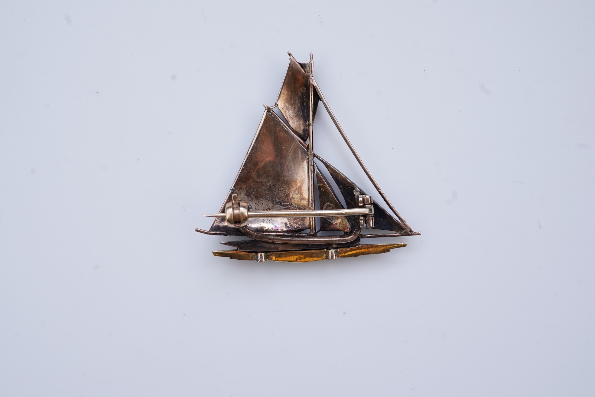 An enamel and diamond novelty brooch, early 20th century